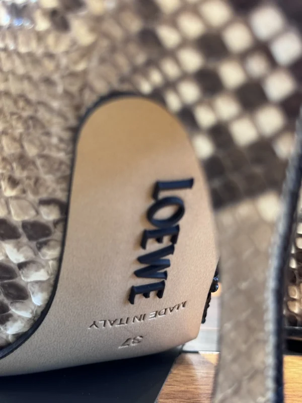 TACON LOEWE PIEL SERPIENTE